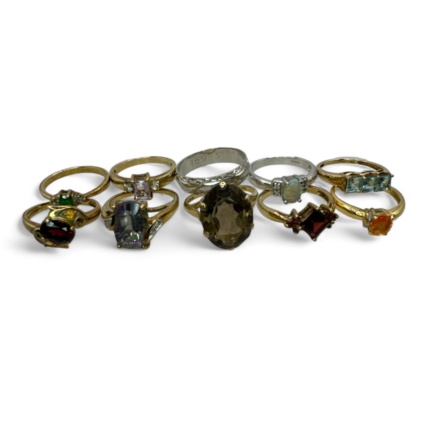 A collection of 9 gem set rings in hallmarked gold, together with a 9ct gold band ring.