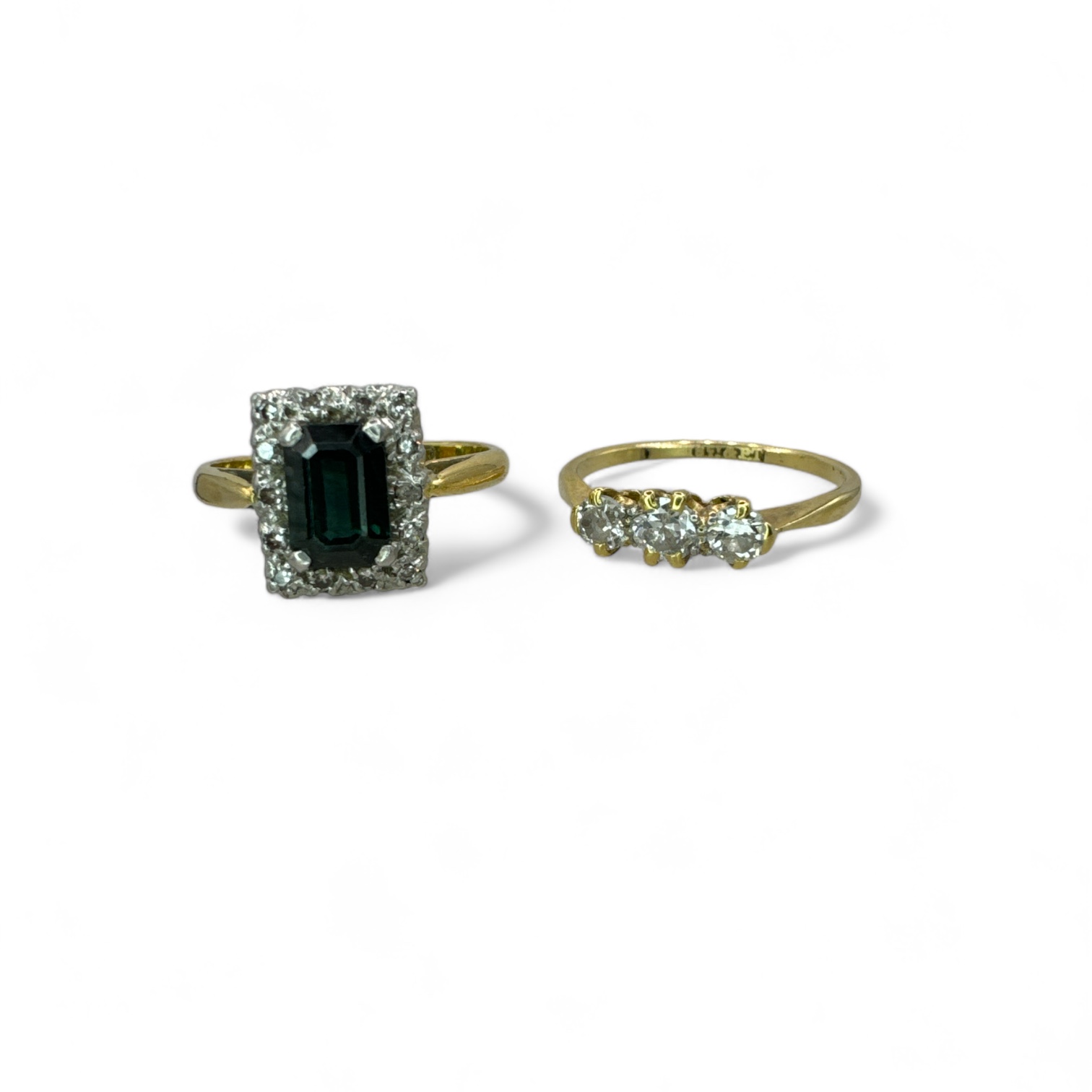 Two diamond set early 20th century dress rings. Comprising a sapphire and diamond dress ting, set