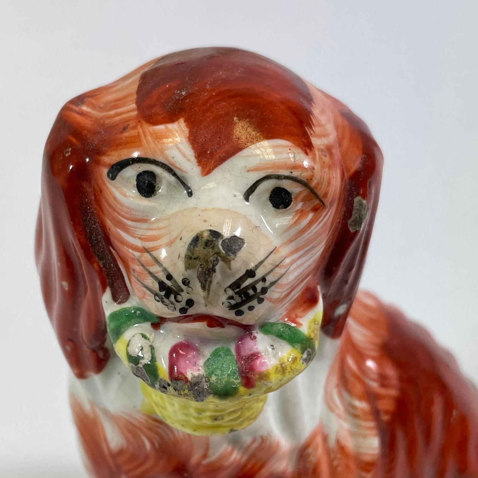 ***AWAY*** A collection of 18 various Staffordshire spaniel dogs. Chips and cracks throughout. - Image 15 of 16