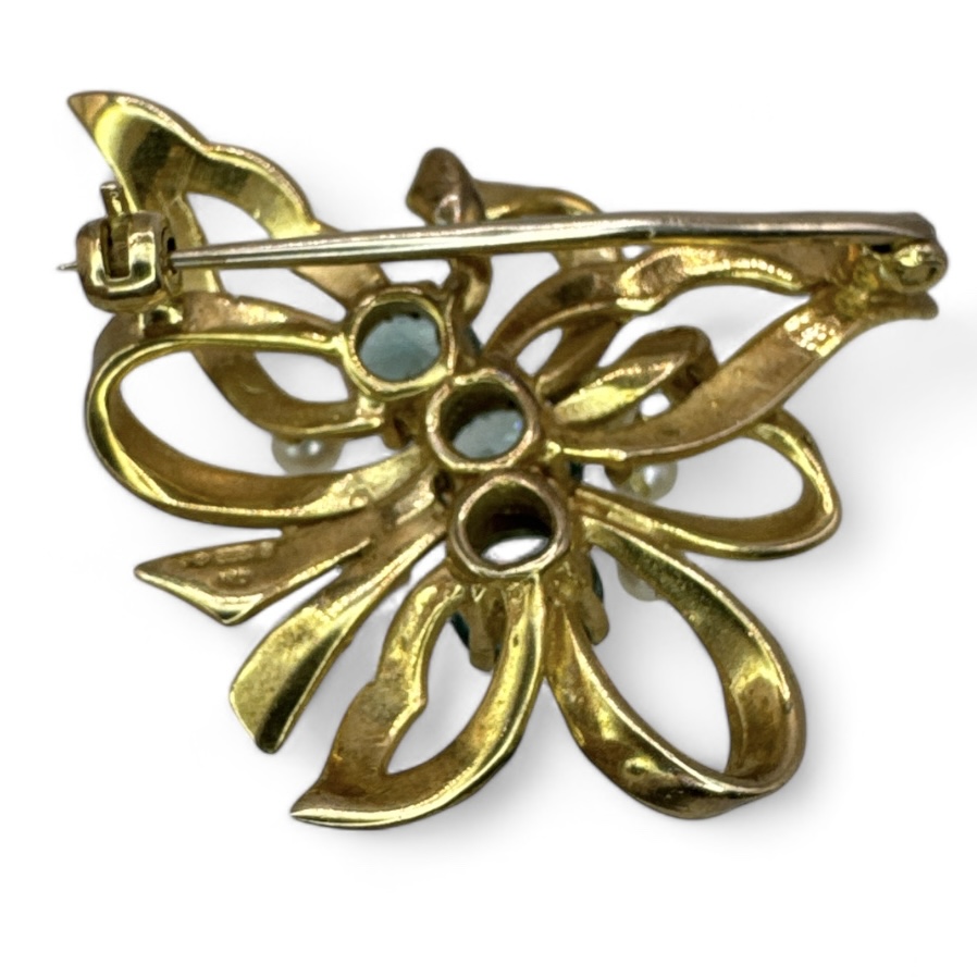 A Zircon and seed pearl spray brooch, set with three round brilliant cut Zircons. ZIrcon is a - Image 2 of 2