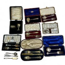 Four boxed christening flatware sets, a boxed egg cup and napkin ring and assorted plated ware.