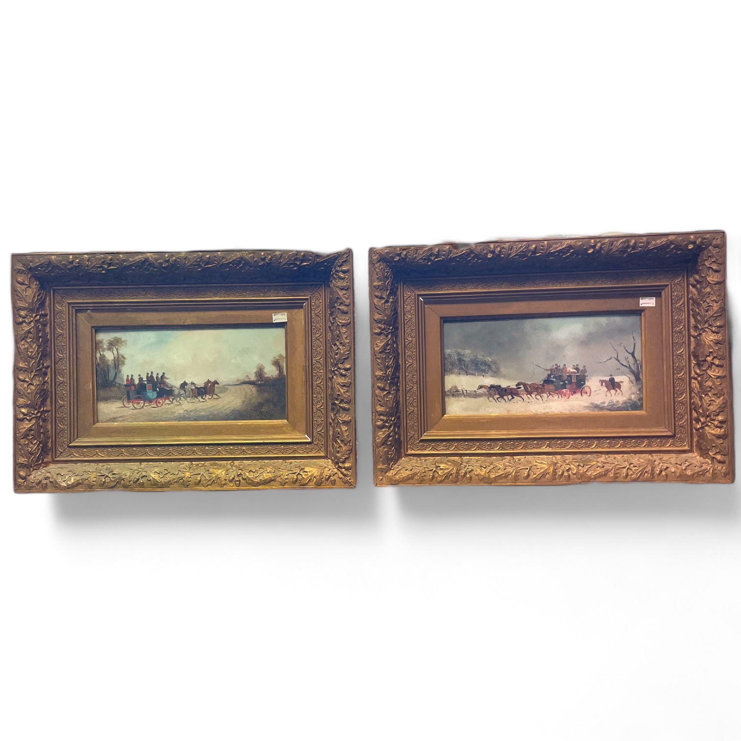 A pair of coaching scenes, oil on board signed indistinctly in gilt frames. Frame size 61cm by 43cm