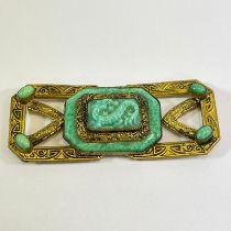 A Czechoslovakian buckle with central jade effect dragon design. 7cm x 1cm x 3cm.  Condition: 2