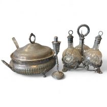 A large silver plated tureen, a lantern and a three decanter silver plated stand (bottles damaged)