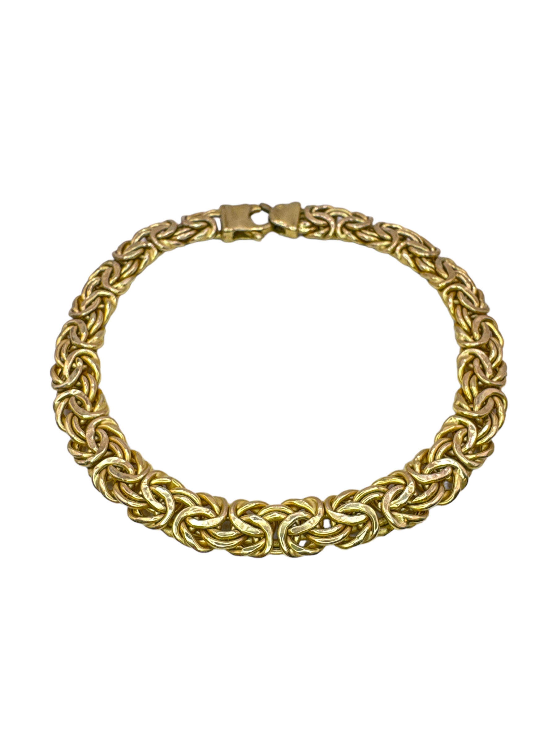 A 9ct yellow gold flat Byzantine chain bracelet. With lobster clasp. Approximate length 19cm.