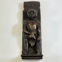 An early oak carved panel piece of a man with loin cloth. 17th century or earlier 9cm x x4cm x