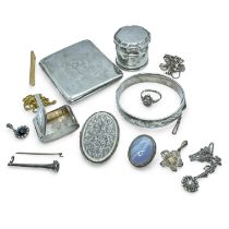 A collection of silver to include a cigarette case, snuff box, hinged bangle, a blue lace agate