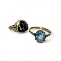 A garnet set Arts & Crafts style ring, along with a 9ct gold dress ring. The Arts & Crafts style