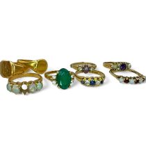 A collection of rings in 9ct, 18ct and unmarked gold. Featuring an 18ct sapphire and diamond early