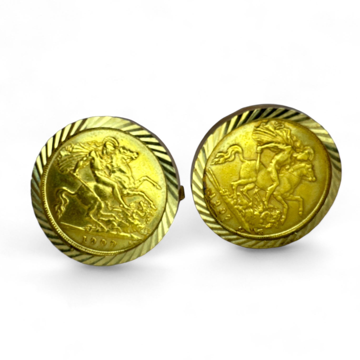 A pair of 9ct gold cufflinks, each set with an Edward VII gold half sovereign. dated 1907 and