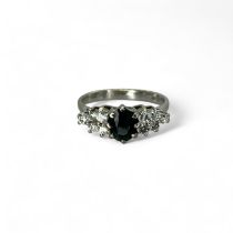 An 18ct white gold diamond & sapphire dress ring. Size M1/2. Gross weight approximately 2.86 grams.