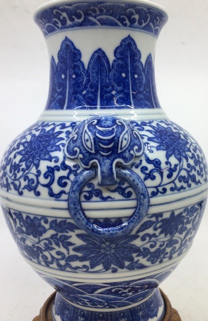 A Chinese blue and white twin-handled Zun vase, height 23.8cm, together with a stand.  Condition - Image 2 of 8