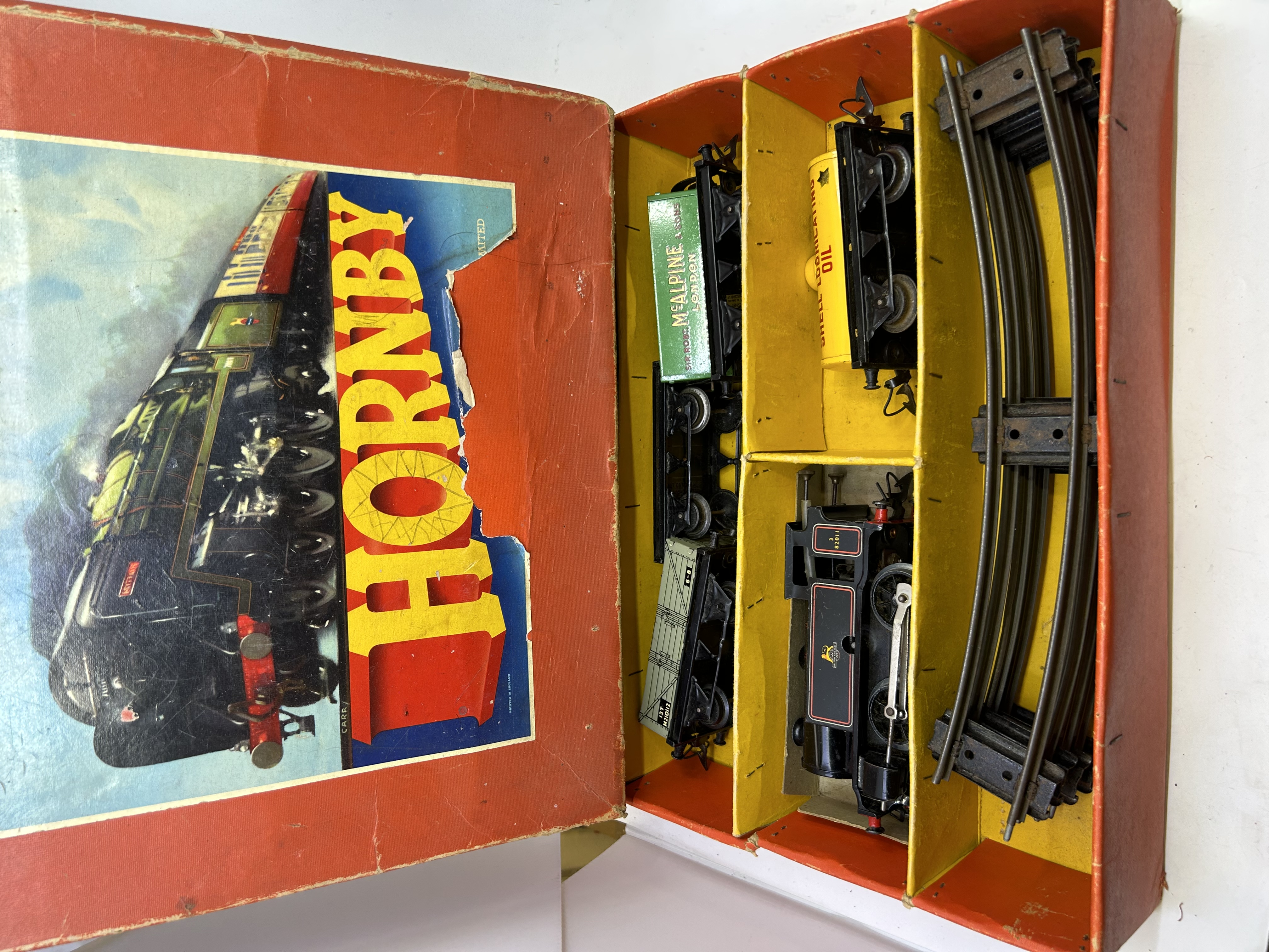 Hornby a cased Horny train set and a qty of carriages trains and other associated O gauge items