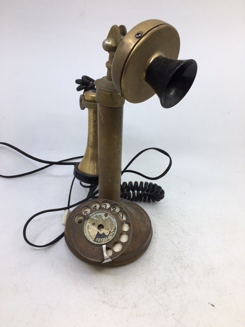 A vintage bronze telephone (a/f)