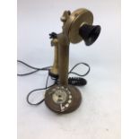 A vintage bronze telephone (a/f)