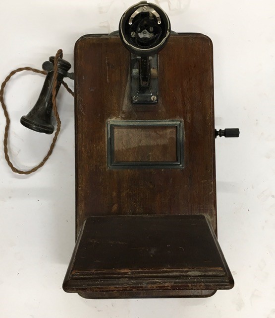 A vintage telephone (a/f)