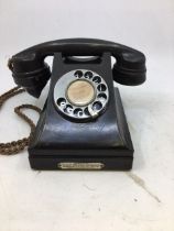 A vintage black bell telephone (AUTOPHONES LTD)