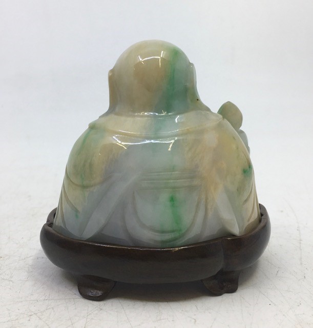 A  Chinese pale green carved jade figure depicting buddha - Image 2 of 3