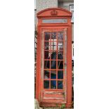 A scarce early K2 telephone box  There is an AB box with shelving, board and pyramid phone, which go