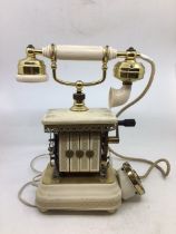 A vintage white bell telephone (MADE IN DENMARK)