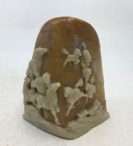 A Chinese carved stone figural group