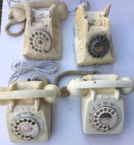 A collection of four white bell telephones (a/f)