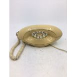 A vintage white telephone