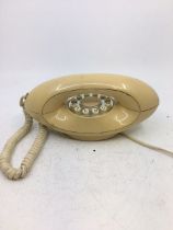 A vintage white telephone