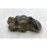 A  Chinese carved jade figure