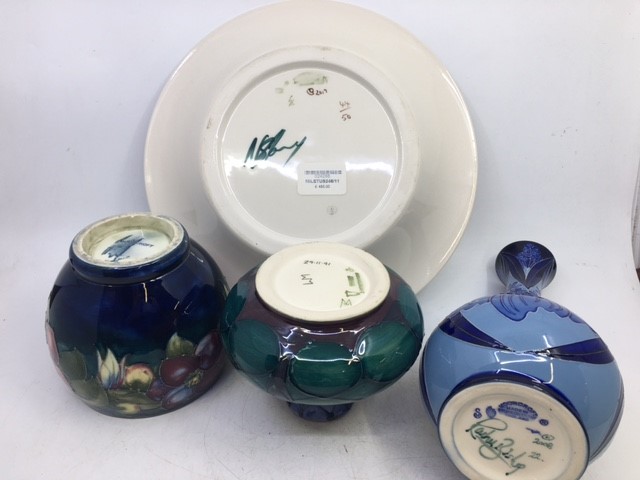 A collection of four Moorcroft art pottery too include a rare design plate  and four vases. H: - Image 2 of 2