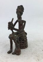 A Indian bronze figure of a man. H:11cm