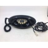A vintage black telephone