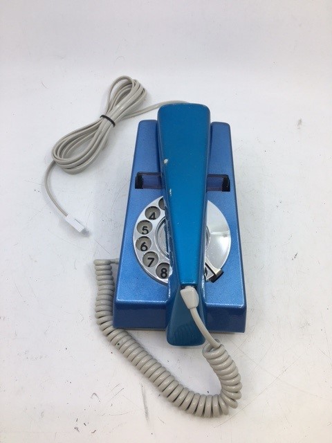 A vintage blue telephone