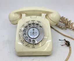 A vintage white bell telephone (706L, PX60/I)