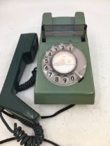 A vintage green telephone