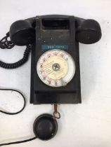 A vintage bell telephone, (PROPRIETE DE L'ETAT P.T.T. , APPAREL  MANUAL B.C.L. 355-1 NO: 16404) (a/