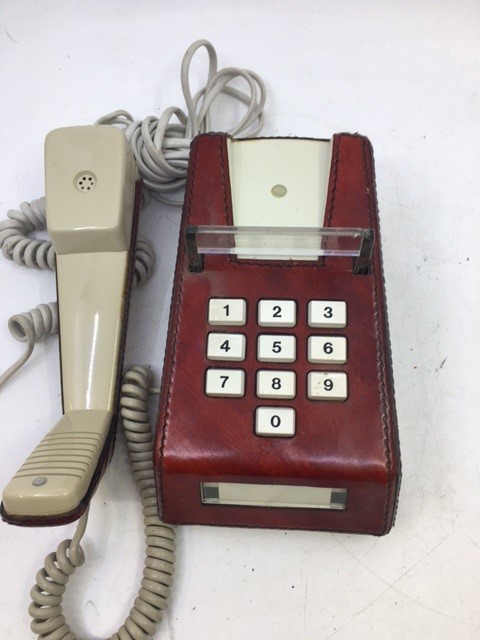 A vintage telephone with read leather cover, (TELE. SR. 1016A, S.T.C. 80/1) - Image 2 of 3