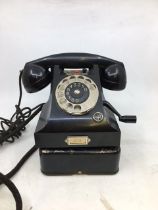 A vintage black telephone with stand (TELEGRAFVERKETS, VERKSTAD, NYNASHAMY), (BG 461/1, Schema,