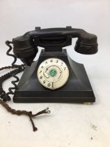 A vintage black bell telephone (a/f)