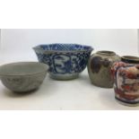 A collection of oriental items to include a Chinese blue and white bowl (a/f), a Chinese earthenware