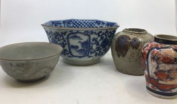 A collection of oriental items to include a Chinese blue and white bowl (a/f), a Chinese earthenware