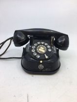 A vintage black bell telephone (RTT-56. A)