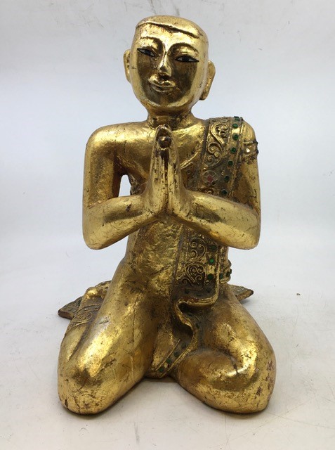 An Asian figure of a monk, H:31cm