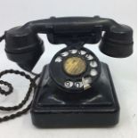 A vintage black bell telephone