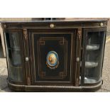 A 19th cent ebonised Credenza with Gilt ormolu mounted Sevres style panels , retaining original key