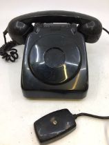 A vintage black telephone (a/f)