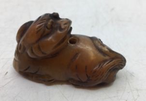 A  Chinese carved jade beast