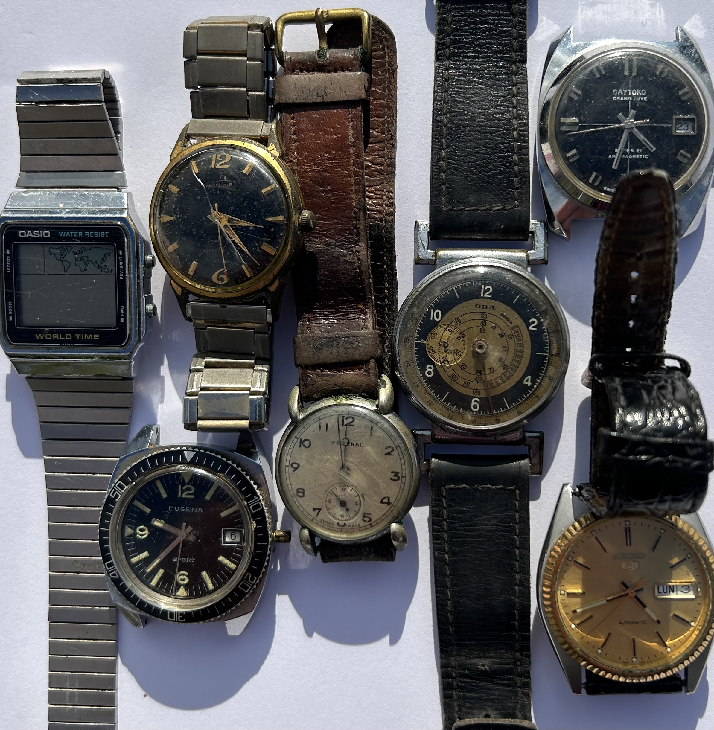 A collection of seven vintage gents watches