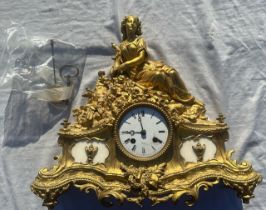 A fine quality French Ormolu mantle clock , Rollin a Paris complete with key and pendulum , and a