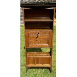 An arts and crafts bookcase with  chequered banded inlay